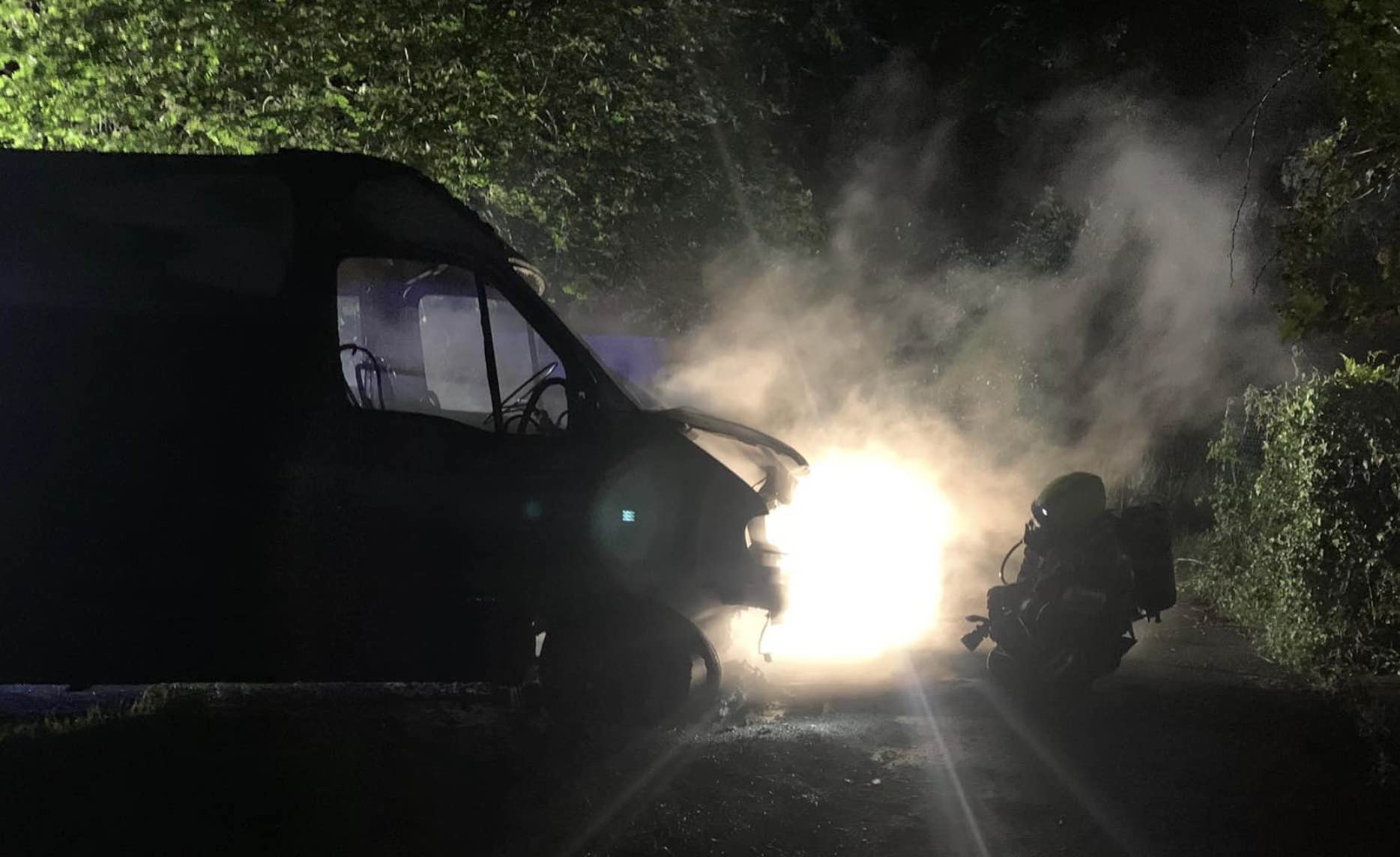 Firefighters, Wearing Breathing Apparatus  With Two High-pressure Hose Reels, Quickly Brought The Blaze Under Control After The Arson Attack