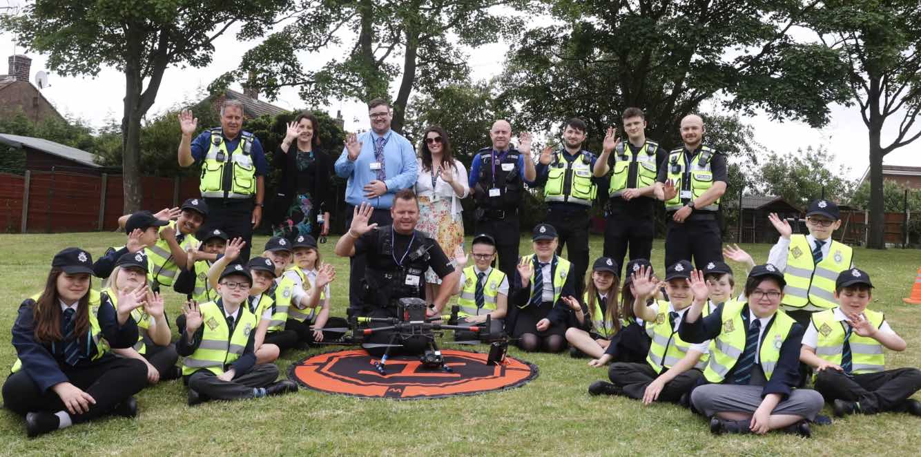 Schoolchildren Gazed Up At The Sky In Awe As They Witnessed A Practical Demonstration Of Cutting-edge Police Technology