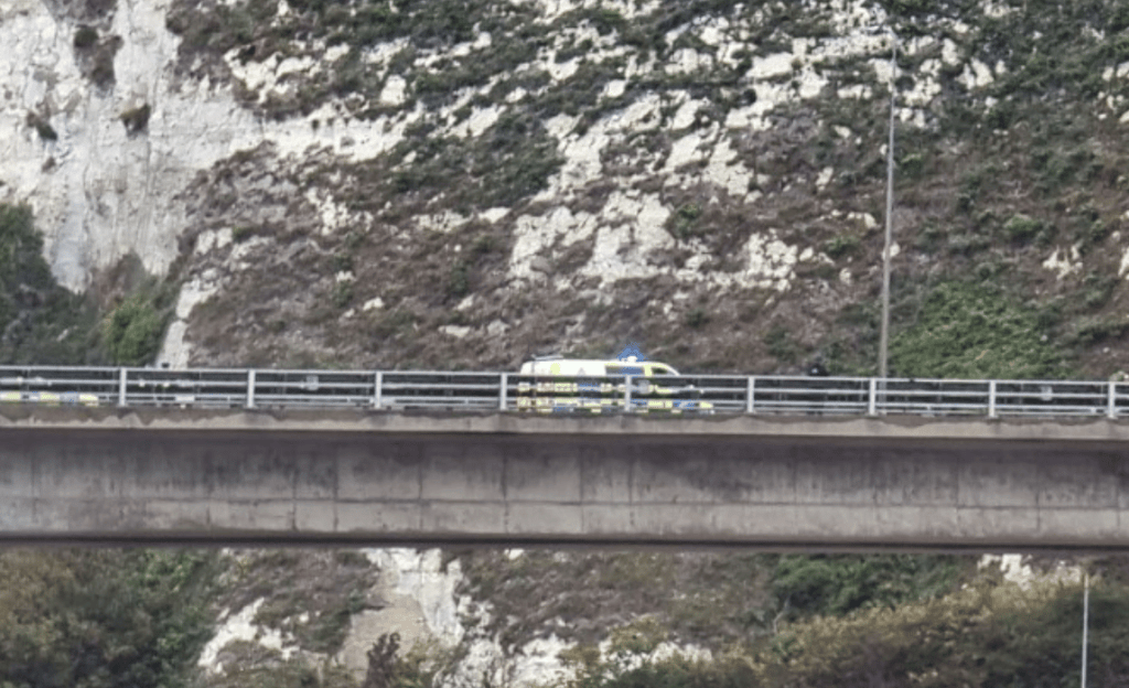 The A2 Jubilee Way Above The Port Of Dover Has Been Closed In Both Directions Due To A Protest By A Man On The Edge Of The Road Bridge