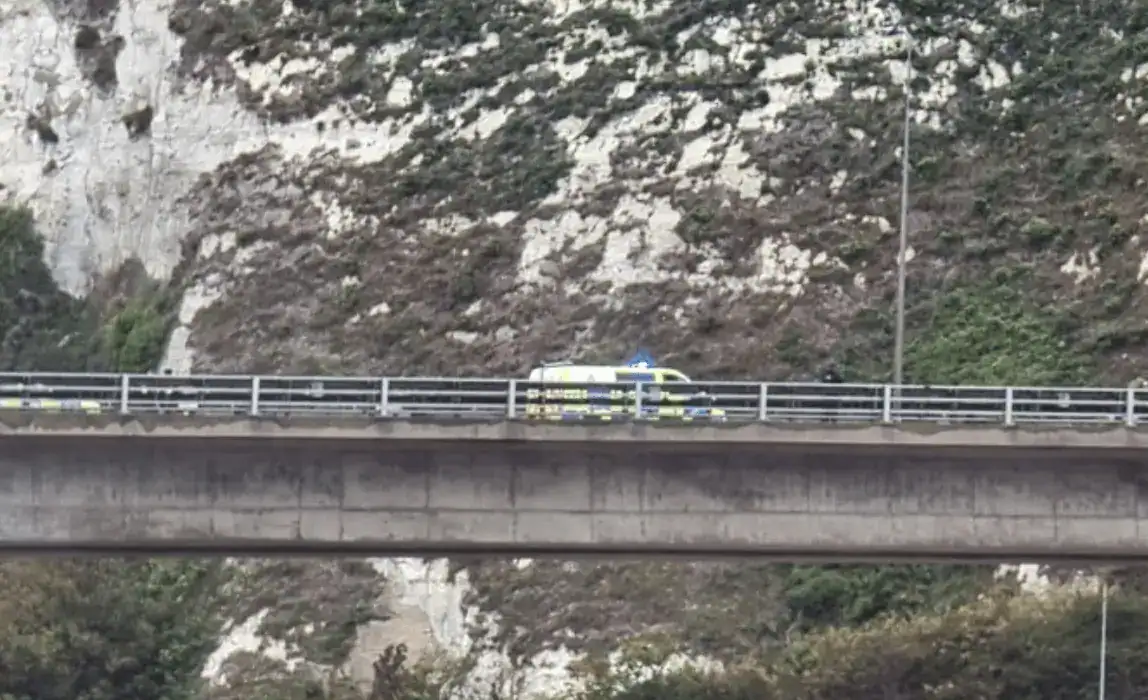 The A2 Jubilee Way above the Port of Dover has been closed in both directions due to a protest by a man on the edge of the road bridge