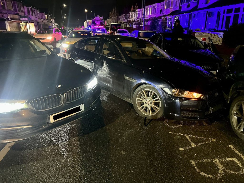Officers On Patrol In Mitcham Seized A Stolen Jaguar, Which Contained Five Suspects Wearing Balaclavas And Stab Vests Armed With Swords