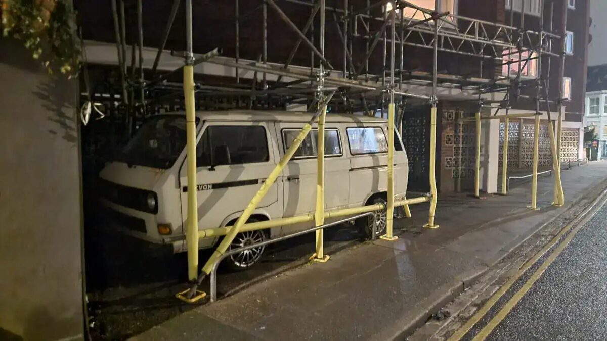 Scaffolding erected around parked van in Brighton