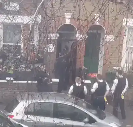 Armed police storm an East London property as a man wanted for ‘threats to kill’ is apprehended