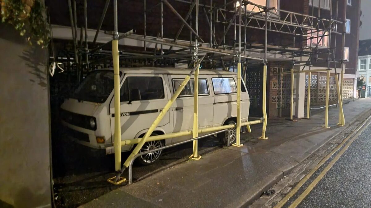 Scaffolding erected around parked van in Brighton