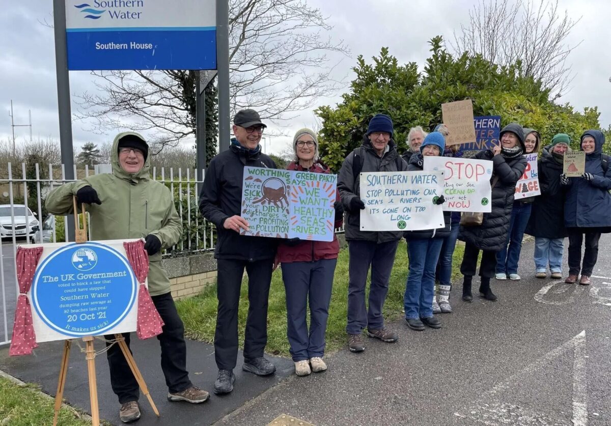 Protesters demand end to sewage pollution outside Southern Water headquarters