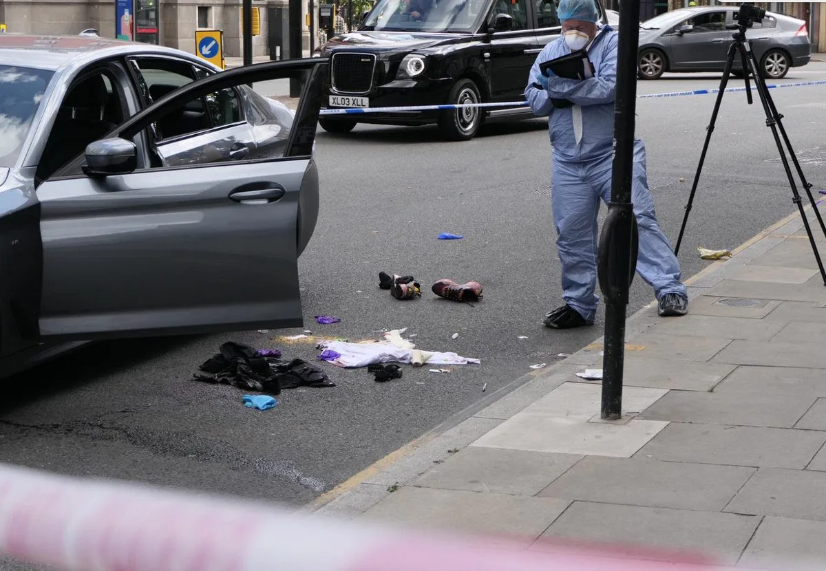 Police confirm four stabbed two fighting for life  in City of London Bloodbath