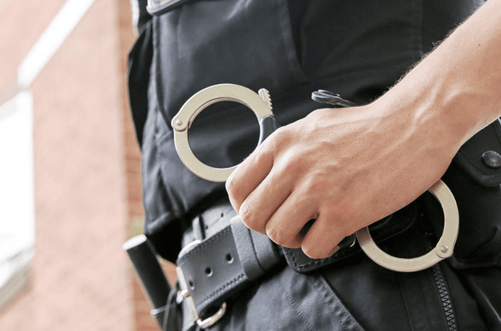 Police Arrested Two People After Finding A Number Of Weapons Including A Machete When They Raided A Property