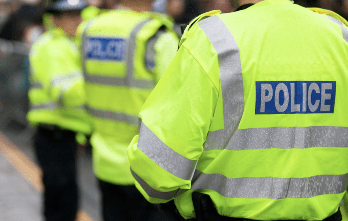 Detectives Investigating A Fight In The Middle Of The Street Between Three Men And A Teenager Are Asking For The Public's Help