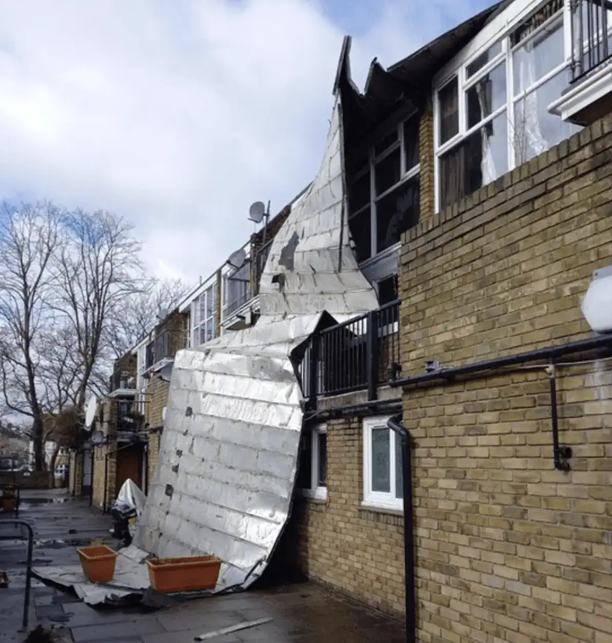 Firefighters were called to a partial roof collapse at a flat on Longford Walk in Tulse Hill