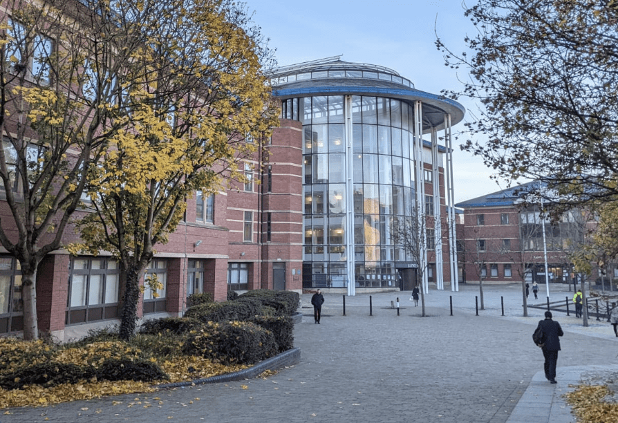 Suspect Charged After Woman Threatened