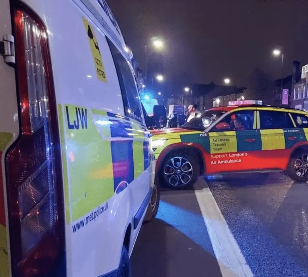 After being stabbed on a North London street, a man is fighting for his life in a hospital bed