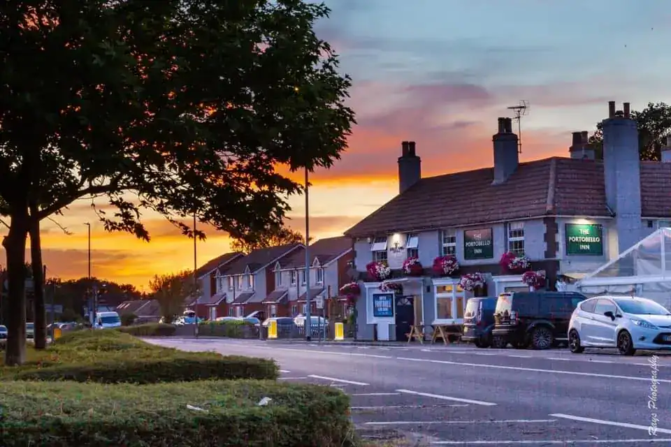 A man driving a white van is said to have slowed down as he passed two teenage girls and then was seen performing an indecent act