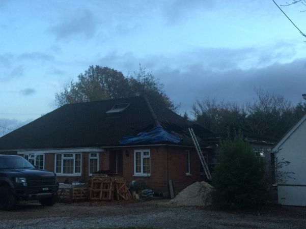 Fire Crews Tackle Serve Roof Fire  At Bungalow Near Winchester