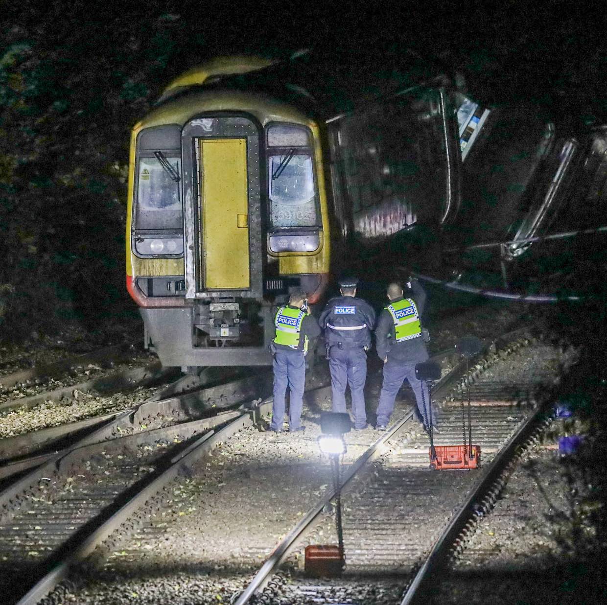 Specialist Officers Remain At The Scene Conducting Searches Of The Area And Finishing Their Evidence Recovery Before The Train Carriages Can Be Removed