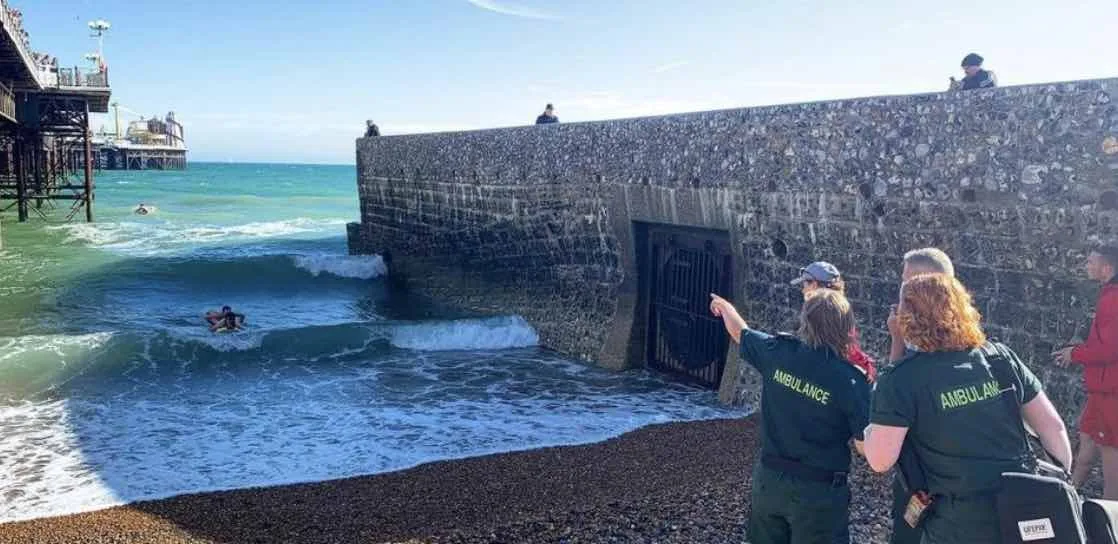 Two 15-year-olds were reported in distress in the water near the Palace Pier, attempting to return to shore