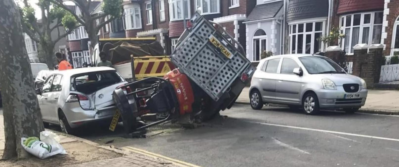 Following A Collision Between Two Cars And A Mini Digger This Morning, Two Schoolchildren Escaped Serious Injury