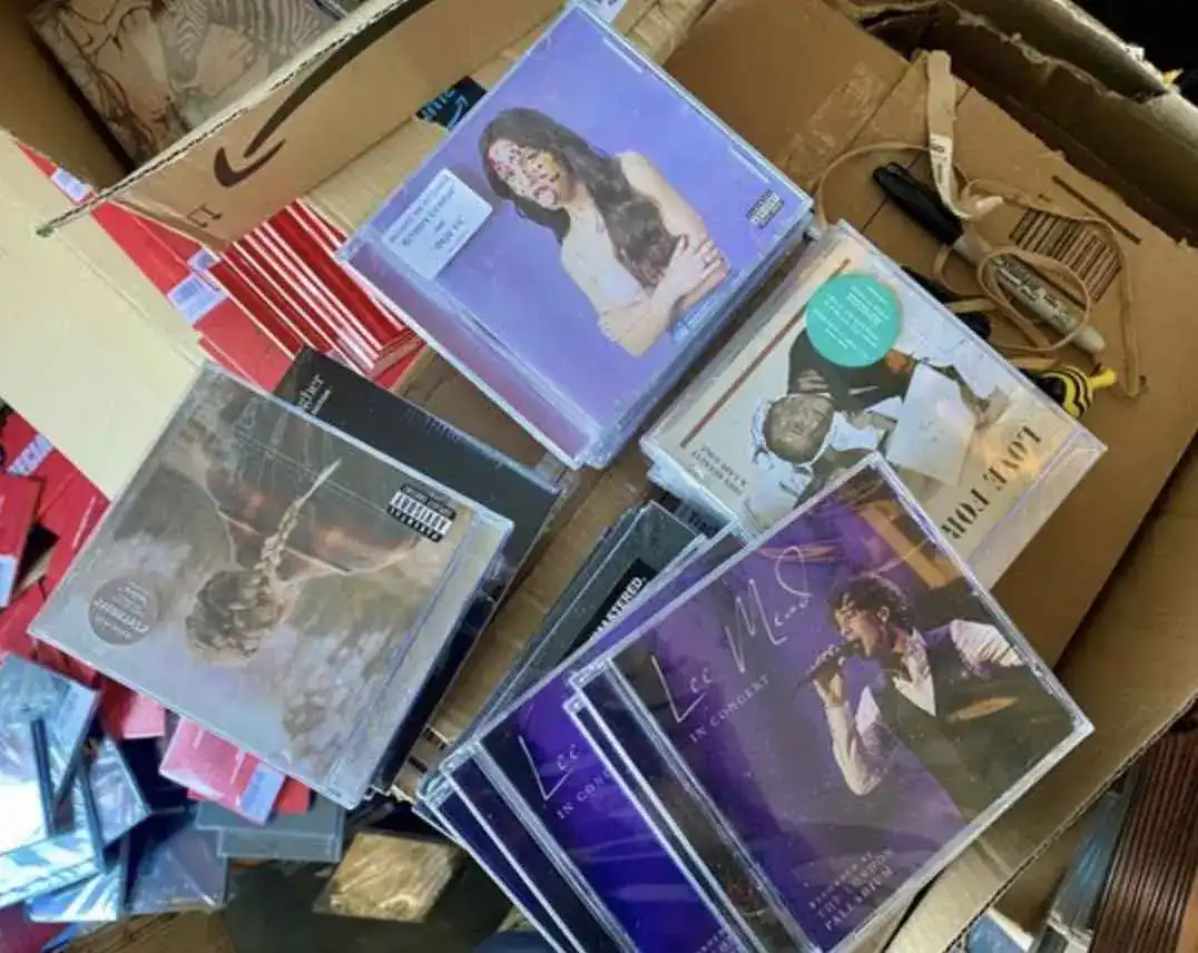 During warrants in the Wirral, Merseyside, officers from the City of London Police’s Police Intellectual Property Crime Unit (PIPCU) seized counterfeit CDs worth an estimated loss to the industry of £169,708