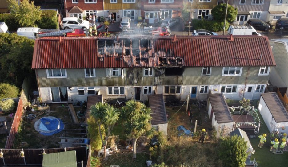 Firefighters Battle A House Fire In Portsmouth After It Spreads To The Roof