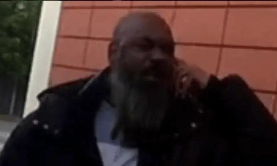 Officers investigating an incident in which a man threatened a member of rail staff with violence at Greenhithe station have released an image of a suspect