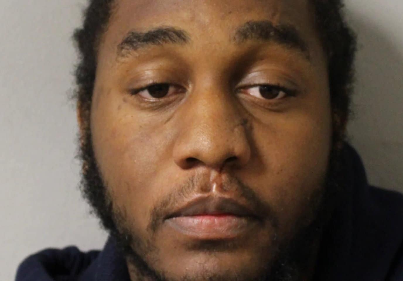 A £10,000 Reward Remains On Offer For Information To Trace A Man Who Is Wanted In Connection With A Murder Of Michael Fadeyibi In Newham