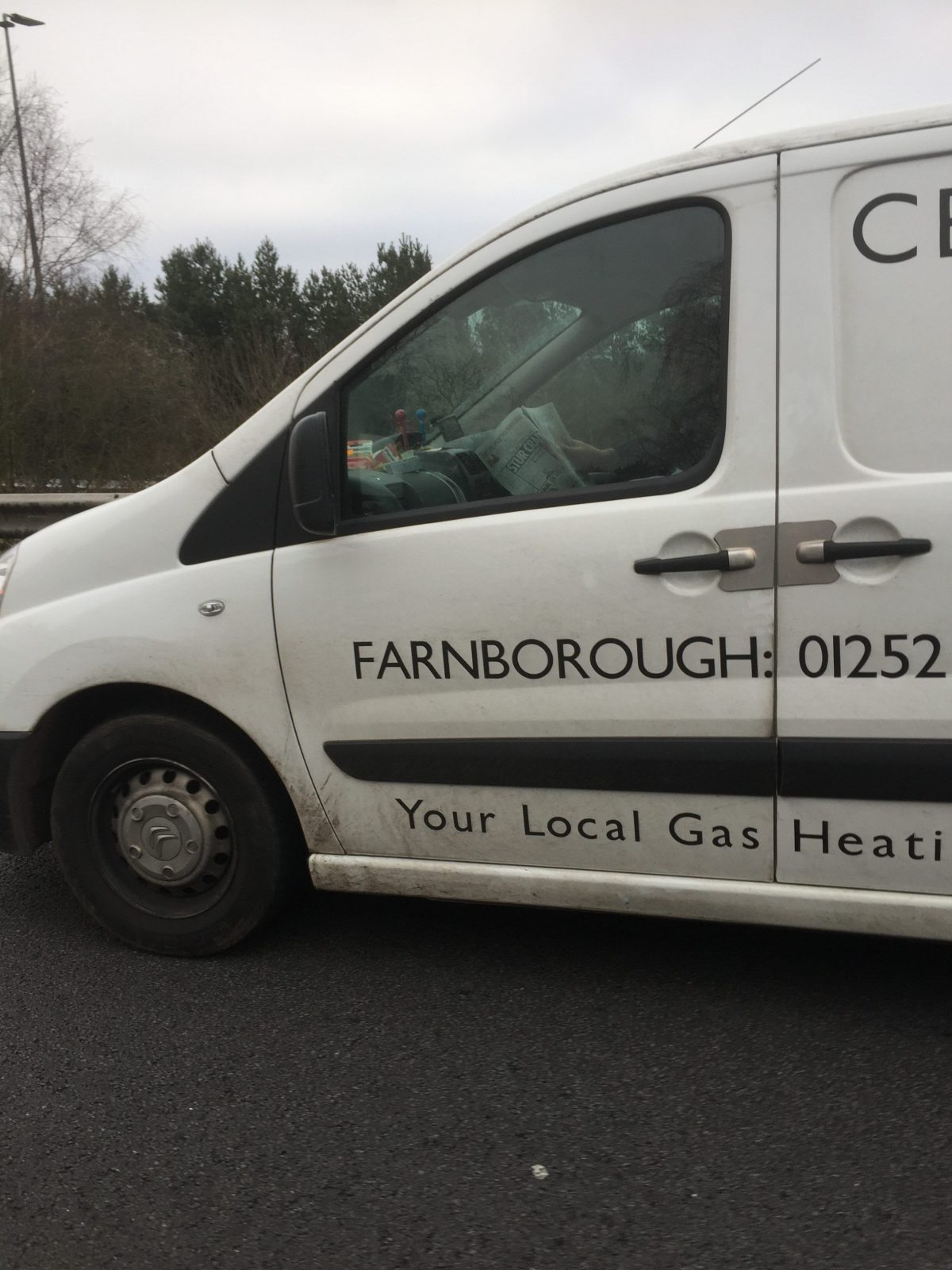 White Van Man  Caught Having A Long  Read On The Busy M3 Motorway