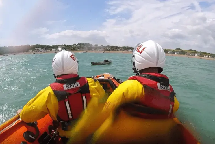 Walmer RNLI Lifeboat launched  to reports of three people in the water off Kingsdown
