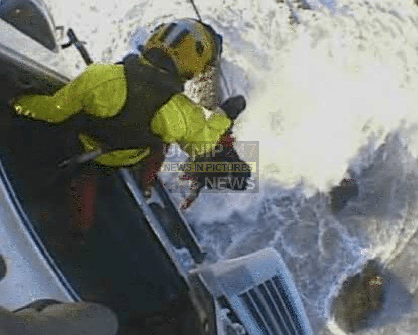 Incredible Scenes Of Coastguard Winchman Battered By 6ft Waves During Dramatic Rescue