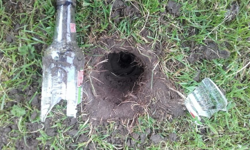 Mindless And Thoughtless As Broken Glass Bottles Left In Grass