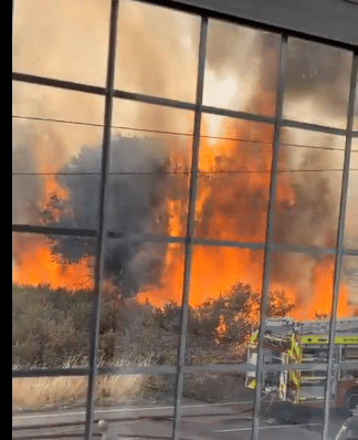 A Grass Fire Near Longleigh Lane In Bexleyheath Is Being Fought By Six Fire Engines And Approximately 40 Firefighters.