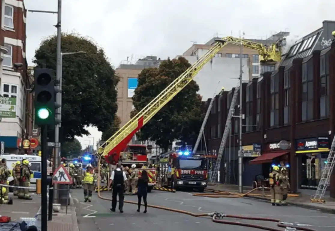 Ten Fire Engines And Around 70 Firefighters were Called To A Fire At A Flat Above A Shop On Broadway In West Ealing This Afternoon