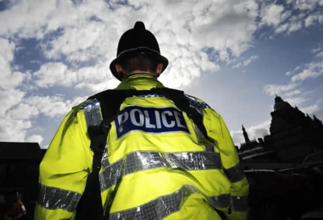 Armed standoff with Police  in a flat continues as surrounding properties are evacuated