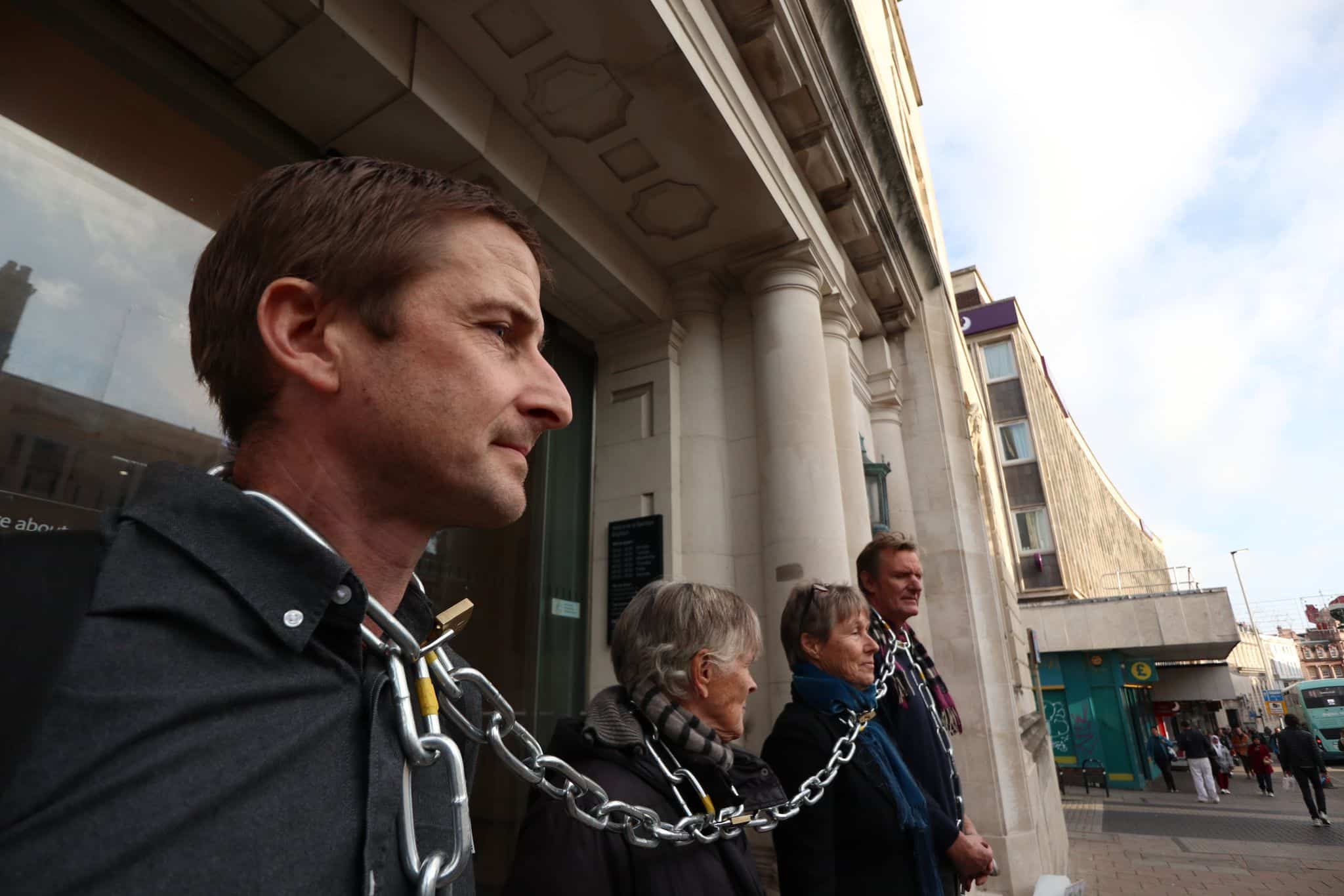 Extinction Rebellion Protesters Arrested After Chaining Necks To Brighton Barclays