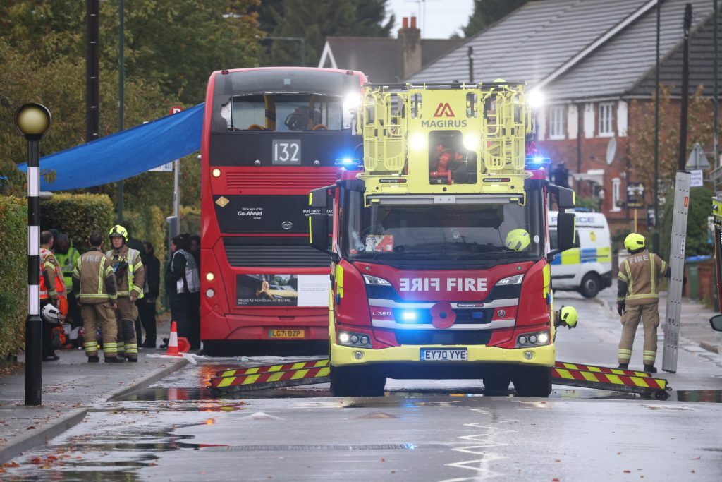 Emergency Response Team Rushes To Aid Heart Attack Victim On London Bus