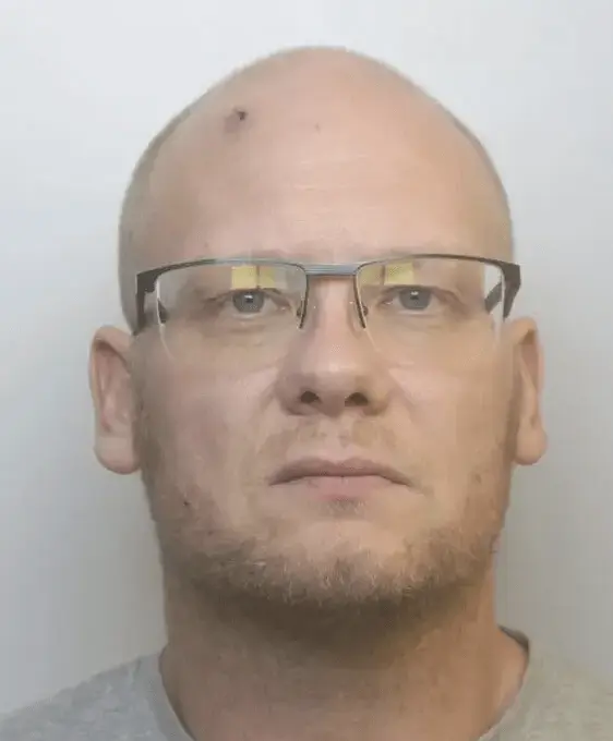 A man who drove an American military-style truck at several police vehicles as he tried to evade arrest has been jailed for two years.