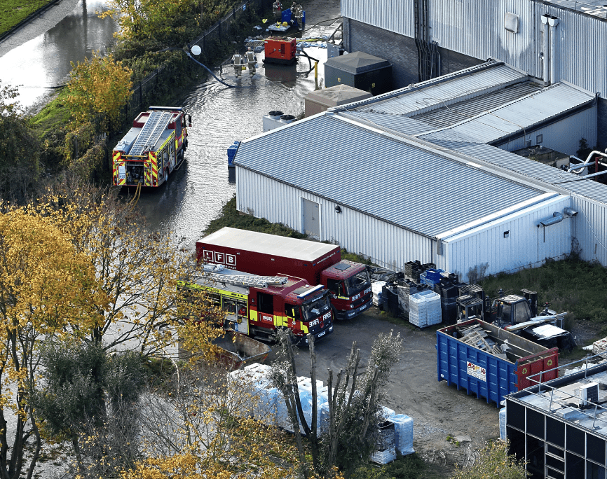 London Fire Brigade Battles To Prevent Flooding At Major Food Supplier  In Erith