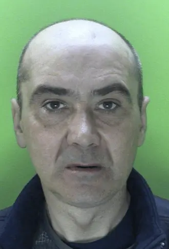 A runaway driver who rammed a police car in a desperate bid to escape has been jailed