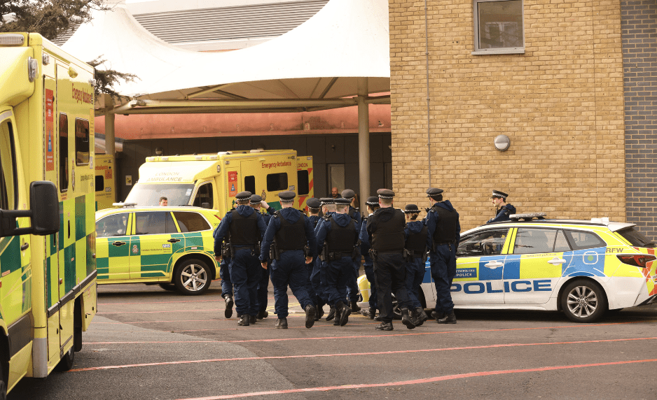 Emergency services responding outside UK hospital.