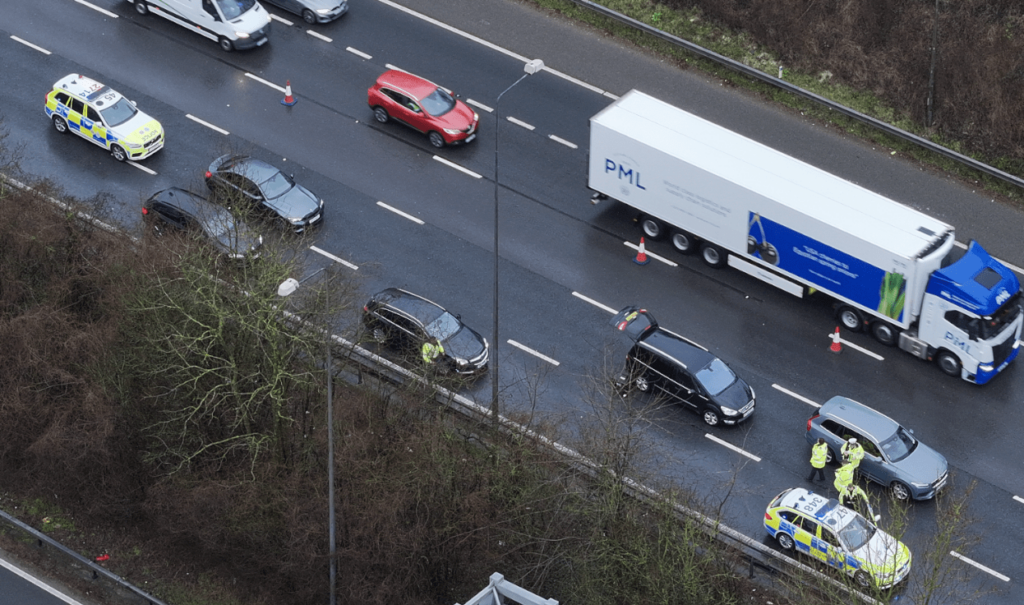 Traffic incident with police on UK motorway.