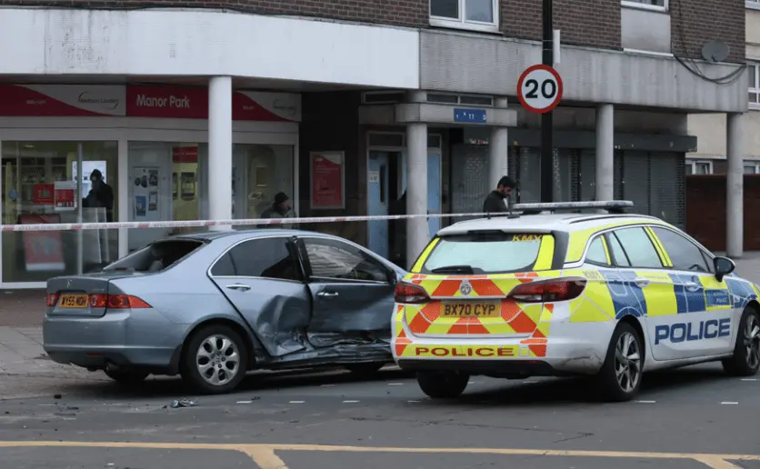 Police Chase Chaos: Met Car Smashes Honda on Manor Park High Street, Traffic Lights Down