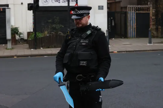 Three men have been arrested and charged by Met officers investigating a shooting incident in Brixton