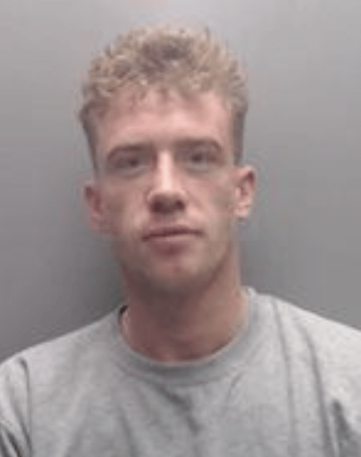 A man who drove a quad bike at a police officer, resulting in serious leg injuries, has been jailed for four years