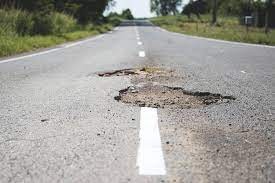 Navigating Potholes: How to Claim Compensation for Car Damage