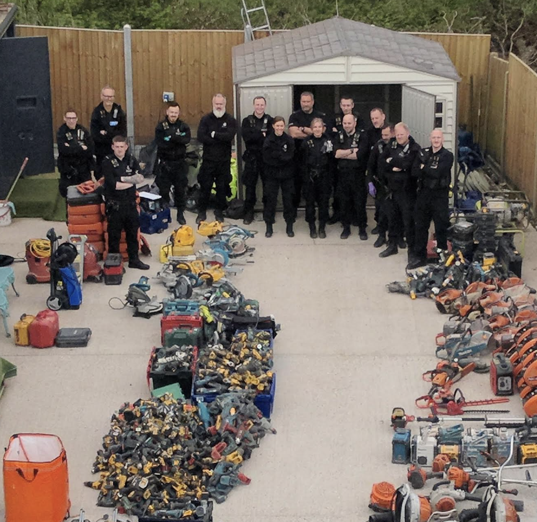 A search for one power tool with a tracking device led to more than 1,000 suspected stolen items being seized and seven arrests being made in Cranbrook