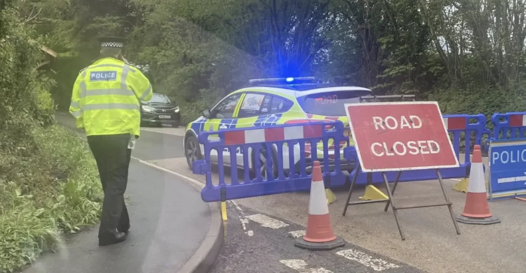 Man Found Dead with Gunshot Wound at Scene of A286 Car Crash in Sussex