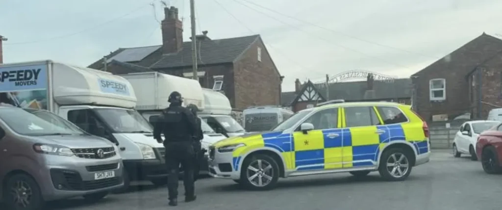 Three Men Charged with Terror Offences After Raids Across Greater Manchester