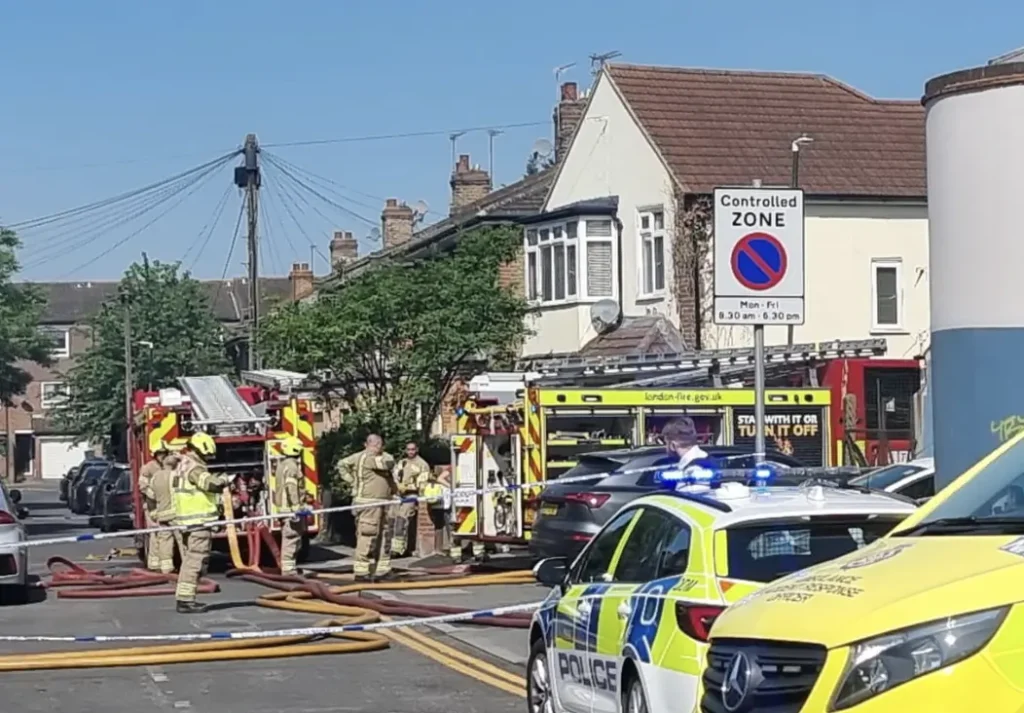 Twelve fire engines and around 80 firefighters are tackling a fire at a block of flats on Woodley Close in Tooting