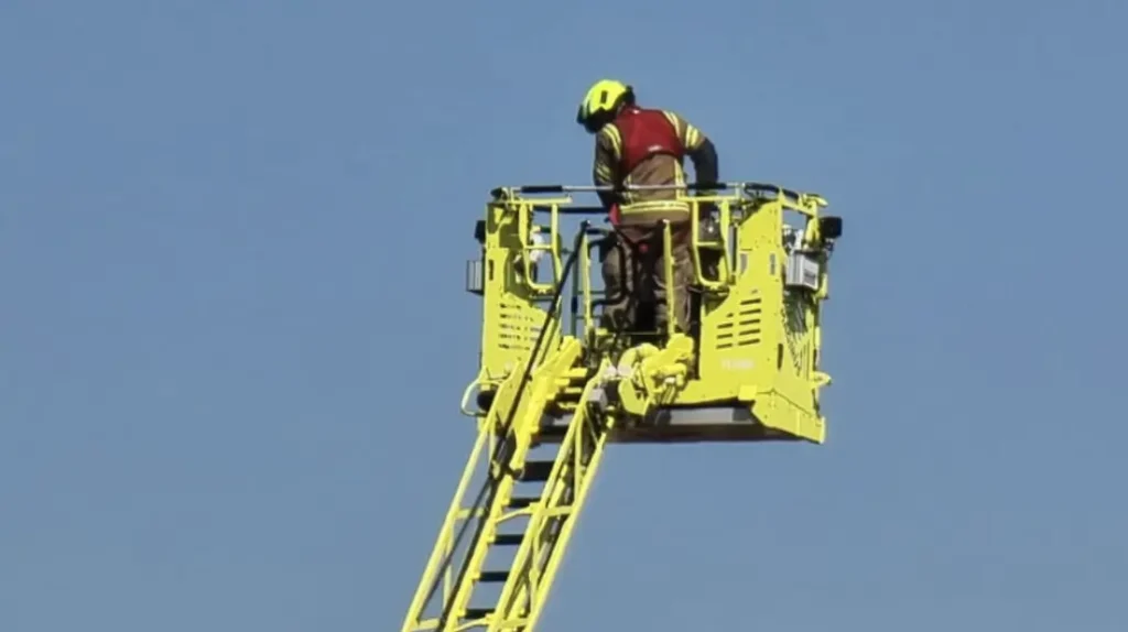 Twelve fire engines and around 80 firefighters are tackling a fire at a block of flats on Woodley Close in Tooting
