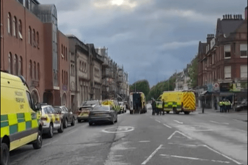 Road Closure Lifted After Police Aid Woman on Scaffolding