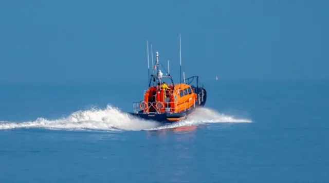 Rescue Operation Underway as Migrant Boat Runs Aground on Kent Beach