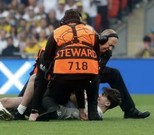 Three people arrested following a pitch invasion during the Champions League Final at Wembley on Saturday evening have been charged